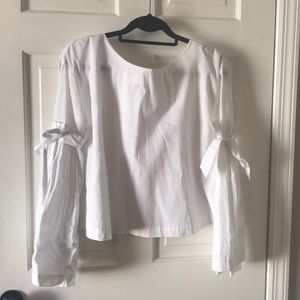 white puffy sleeved blouse